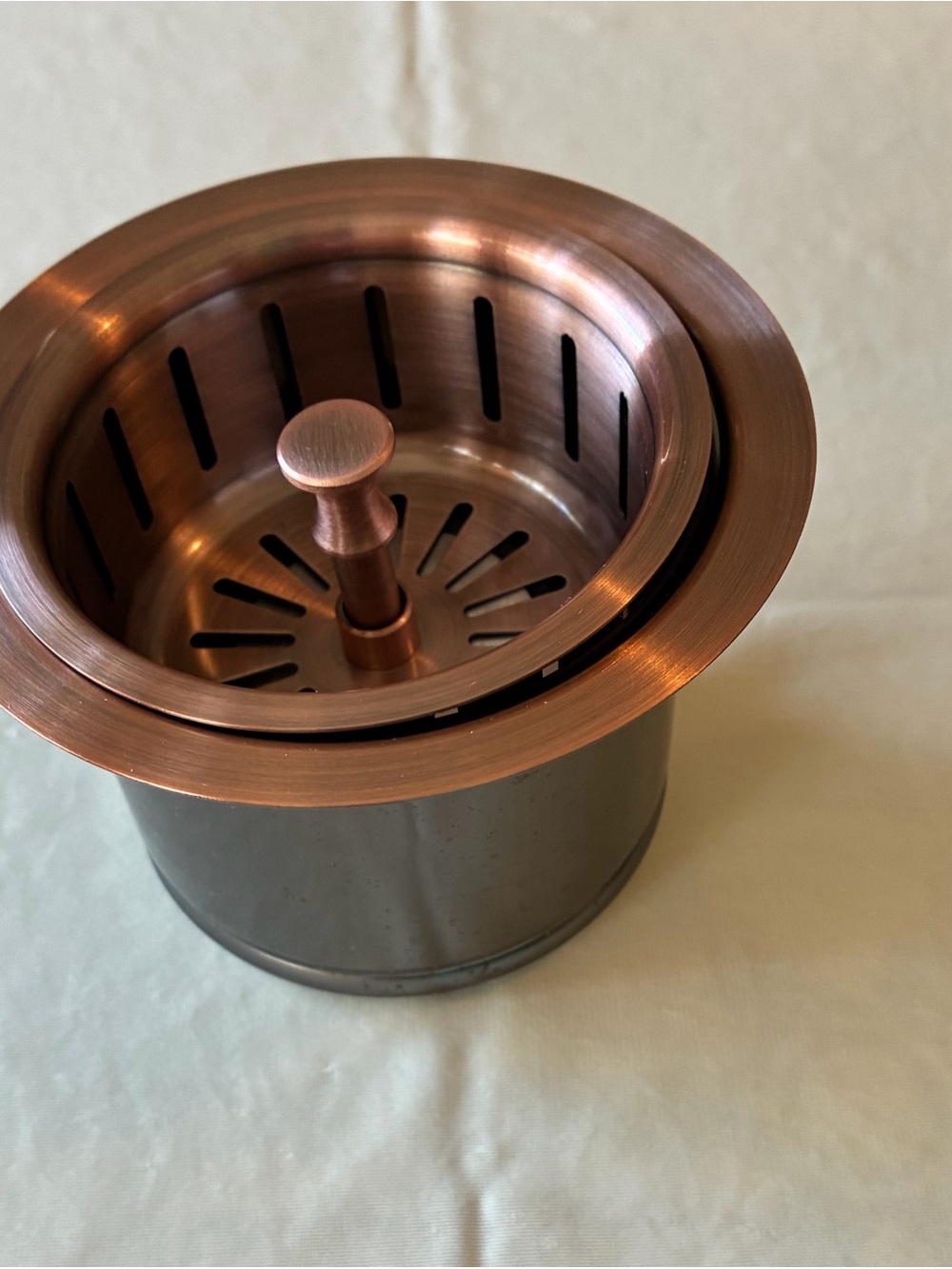 Stylish round copper-finish garbage disposal flange basket sink easy pop-up stop